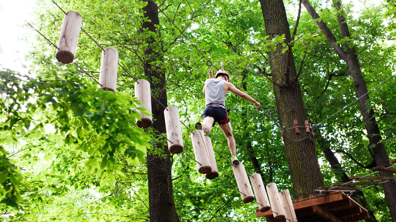 Man walks on the rope path in the air | Hotel Package Ideas